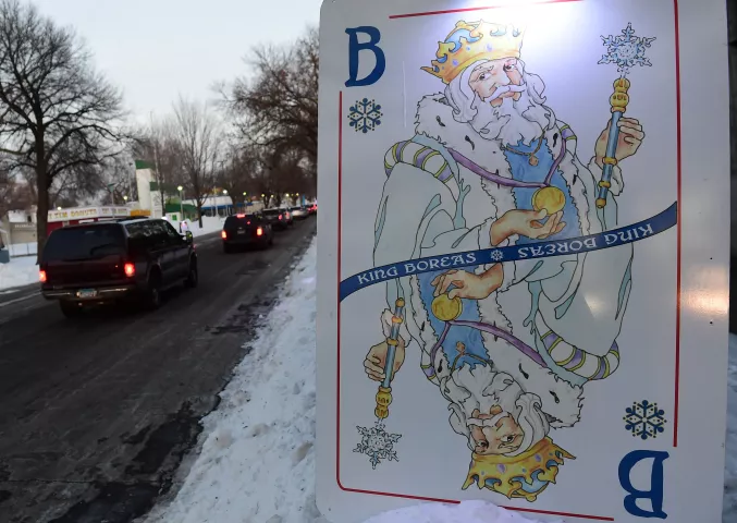 A vintage Winter Carnival King Boreas playing card sign marks the way at the St. Paul Winter Carnival Drive-Thru Ice and Snow Sculpture Park on the Minnesota State Fairgrounds in Falcon Heights on Thursday, Jan. 28, 2021. (John Autey / Pioneer Press)