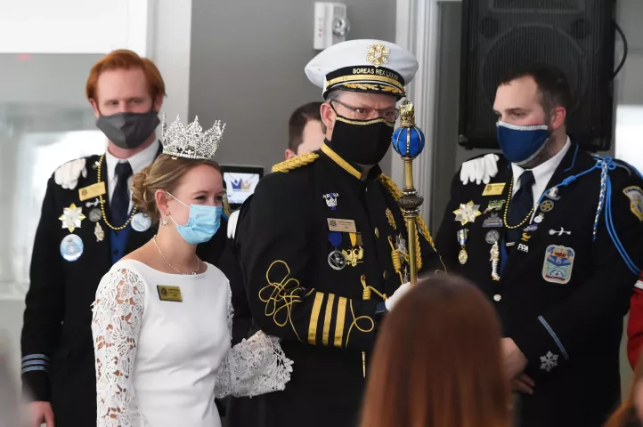 Kirstin Knutson, left, 2020 Aurora, Queen of the Snows, and Darrin Johnson, Boreas Rex LXXXIV, participate in the Annual Queen's Tea, hosted by the Former Queens of the St. Paul Winter Carnival, at the Royal Golf Club in Lake Elmo on Sunday, Jan. 23, 2022. (Scott Takushi / Pioneer Press)