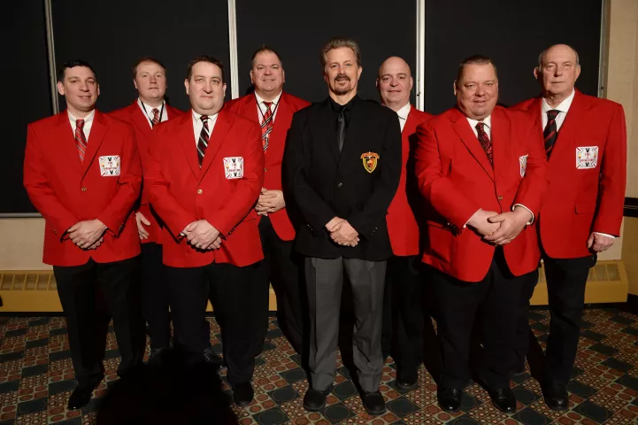 The 2022 Vulcan Krewe, from left: Count of Ashes Michael Daleiden, Count Embrious Kaene Wallace, General Flameous Lawrence Genzler, Baron Hot Sparkus Christopher Seebeck, Vulcanus Rex LXXXV Fred Edstrom, Duke of Klinker Jim Bebeau, Grand Duke Fertilious Bob Westlund and Prince of Soot Bob Flood in St. Paul on Wednesday, Feb.2, 2022. (Scott Takushi / Pioneer Press)