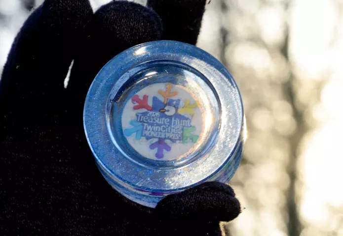 Steve Sanftner of Woodbury holds the St. Paul Pioneer Press Treasure Hunt medallion he found while hunting at Linwood Park in St. Paul on Wednesday, Jan. 28, 2026. (John Autey / Pioneer Press)