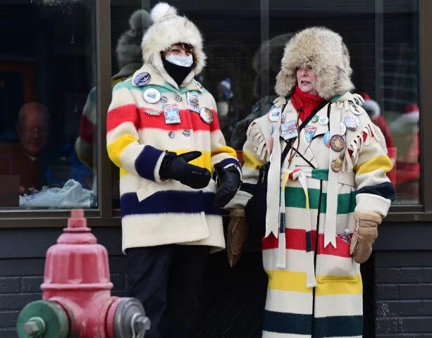 Karen Kilduff and Jane Lonergan sport their vintage Winter Carnival coats as they wait for the 2022 King Boreas Grande Day Parade, Presented by Hamernick’s, along West 7th Street in St. Paul on Saturday, January 29, 2022. (John Autey / Pioneer Press)