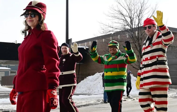 St. Paul Winter Carnival fans wear vintages carnival clothing as the march in the 2022 King Boreas Grande Day Parade, Presented by Hamernick’s, along West 7th Street in St. Paul on Saturday, January 29, 2022. (John Autey / Pioneer Press)