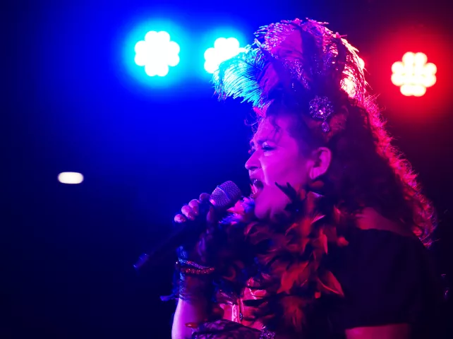 Tina Hacker from Plymouth belts out her song in the first round of the 2022 Klondike Kate competition at the DoubleTree by Hilton in St. Paul on Wednesday, Jan. 12, 2022. (John Autey / Pioneer Press)
