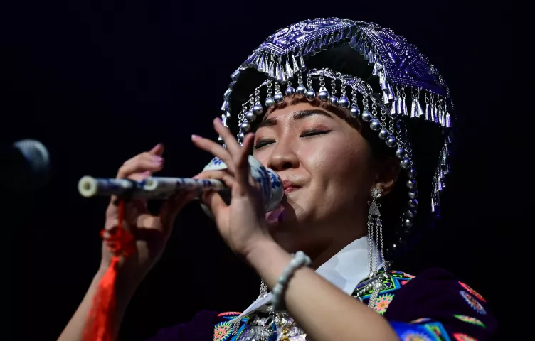 Hillary Lor performs on the Hulusi during the 2022 St. Paul Winter Carnival Royal Coronation at the Saint Paul RiverCentre on Friday, January 28, 2022. (John Autey / Pioneer Press)