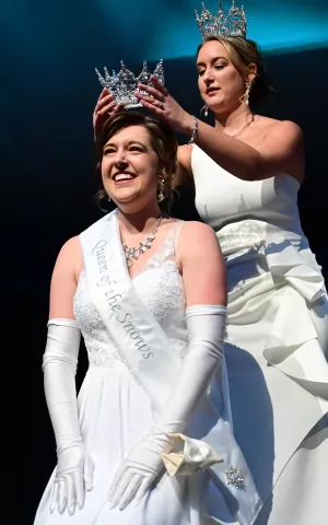 Effie Barne is crowned the 2022 Aurora, Queen of the Snows by outgoing Queen Kirstin Knutson during the St. Paul Winter Carnival Royal Coronation at the Saint Paul RiverCentre on Friday, January 28, 2022. (John Autey / Pioneer Press)
