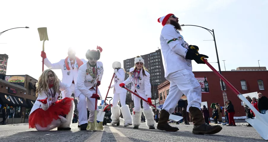 Winter Carnival Tux Team-Pooper Scoopers-do their thing during the 2022 King Boreas Grande Day Parade, Presented by Hamernick’s, along West 7th Street in St. Paul on Saturday, January 29, 2022. (John Autey / Pioneer Press)