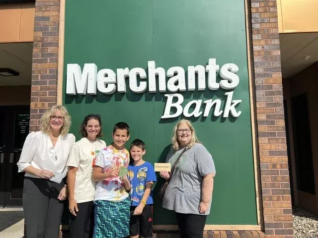 The Halls were the winners of the Leprechaun's Lost Medallion Hunt during Rosemount Leprechaun Days. From left are Michelle Selig of Merchants Bank; Chelsea Hall and sons Banks and Thatcher; and Dawn Littlefield of AAA Auto Parts and U Pull R Parts.