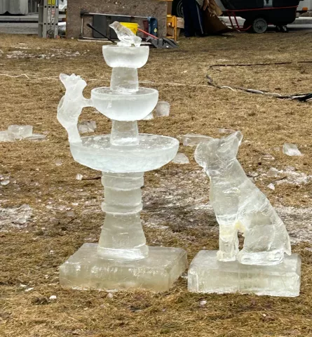"Fountain with Cat, Dog &amp; Bird," an ice sculpture by Jim Zupfer and Nate Stromberg, won first place in the single-block artisan category in the 2023 St. Paul Winter Carnival Ice Carving Competition. (Courtesy of St. Paul Winter Carnival)