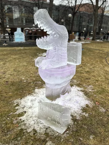 "Crocodile Out of the Toilet," an ice sculpture by AJ Edwards and Rob Graham, won first place in the single-block professional category in the 2023 St. Paul Winter Carnival Ice Carving Competition. (Courtesy of St. Paul Winter Carnival)