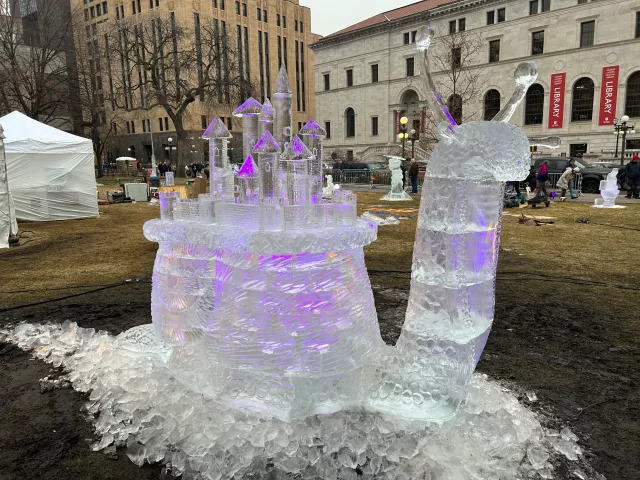 "Snail," an ice sculpture by John Njoes, John Cooper and John Matis won first place in the multi-block category in the 2023 St. Paul Winter Carnival Ice Carving Competition. (Courtesy of St. Paul Winter Carnival)
