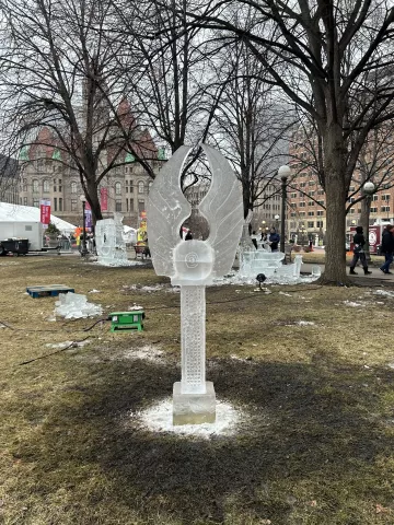 "Eye with Wings," an ice sculpture by Chad Peterson, won second place in the single-block artisan category in the 2023 St. Paul Winter Carnival Ice Carving Competition. (Courtesy of St. Paul Winter Carnival)