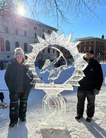Jan. 29, 2023 courtesy photo of the winning entry, "Shoot for the Stars," in the Single Block Professional Ice Carving competition of the 2023 St. Paul Winter Carnival. Team members are Deneena Hughes, left, and Paul Hughes. (Courtesy of the St. Paul Winter Carnival)