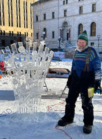 Jan. 29, 2023 courtesy photo of the winning entry, "Rose Trellice," in the Single Block Artisan Ice Carving competition of the 2023 St. Paul Winter Carnival. Team members are John Raak, Randy Raak and Biau Raakin. (Courtesy of the St. Paul Winter Carnival)