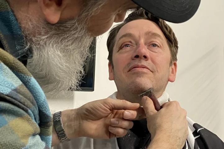 John Dotseth gets a shave from barber Mike Haeg of Good Neighbor Barber Shop at the kickoff event for the St. Paul Winter Carnival’s beard-growing competition on Jan. 6, 2023, at the Pillbox Tavern. The competition, which runs through Jan. 27, is primarily a fundraiser for the carnival’s security efforts. (Jared Kaufman / Pioneer Press)