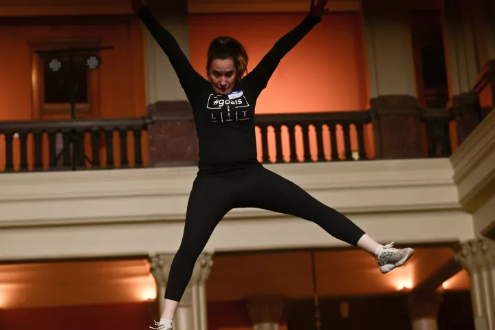 Heidi Mueller from St. Louis Park is sent skyward in her first bounce during the St. Paul Bouncing Team’s Bouncing Girl tryouts at the Landmark Center in St. Paul on Friday, Feb. 2, 2024. “I’m turning 50 this year so I’m conquering fears and trying new things, plus I really want to be in a parade,” said Mueller. One of the oldest and most popular performers in the St. Paul Winter Carnival, the St. Paul Bouncing Team's chant of “One! Two! Up she goes!” can be heard around the Twin Cities as they perform aeri