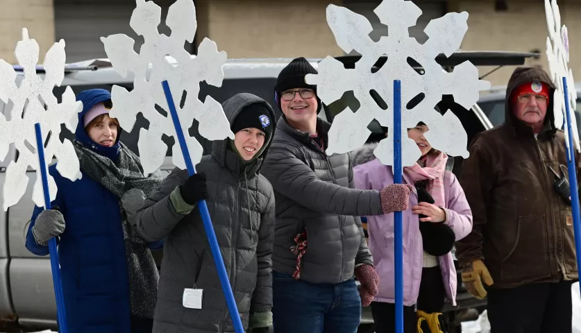 Snowflake bearers assemble prior to the 2023 Winter Carnival Grande Day Parade in downtown St. Paul on Saturday, Jan. 28, 2023. (John Autey / Pioneer Press)