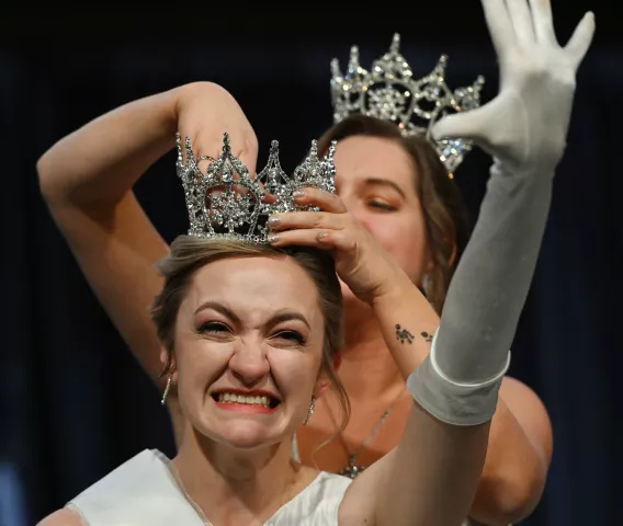 Liv Swenson waves to supporters after being named 2023 Aurora, Queen of the Snows during the 2023 Winter Carnival Royal Coronation at St. Paul RiverCentre on Friday, Jan. 27, 2023. Crowning Swenson is 2022 Aurora Queen of the Snows Effie Barnes. (John Autey / Pioneer Press)