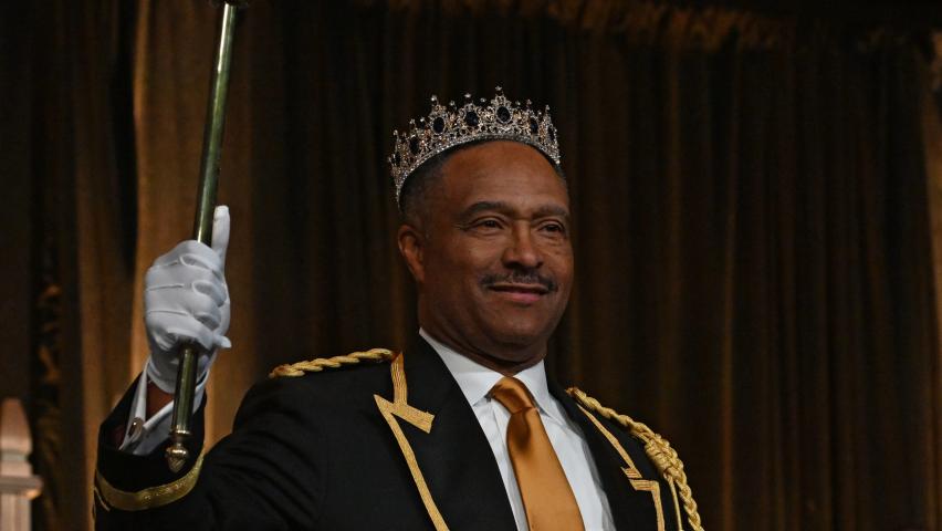 Leo E. Lewis, PhD, raises his scepter after being introduces as Boreas Rex LXXXVI during the 2023 Winter Carnival Royal Coronation at Saint Paul RiverCentre on Friday, Jan. 27, 2023. (John Autey / Pioneer Press)