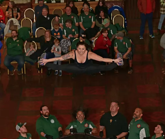Trisha Monsignor entertains the crowd during the St. Paul Bouncing Team’s Bouncing Girl tryouts at the Landmark Center in St. Paul on Friday, Feb. 2, 2024. One of the oldest and most popular performers in the St. Paul Winter Carnival, the St. Paul Bouncing Team's chant of “One! Two! Up she goes!” can be heard around the Twin Cities as they perform aerial acrobatics throughout the year. (John Autey / Pioneer Press)
