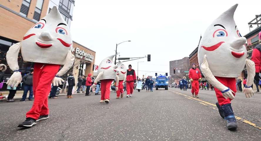 The Hi-lex Gnomes march during the 2024 St. Paul Winter Carnival King Boreas Grande Day Parade along West Seventh Street downtown on Saturday, Jan. 27, 2024. (John Autey / Pioneer Press)