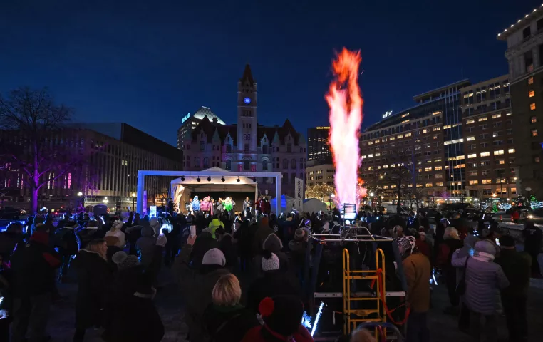 As 2022 Winter Carnival royals speaks, a hot air balloon burner shoots a flame into the sky at Rice Park in St. Paul on Thursday, Jan. 26, 2023. The Royal Family and the Vulcans joined with community members to officially start the 2023 St. Paul Winter Carnival. (John Autey / Pioneer Press)