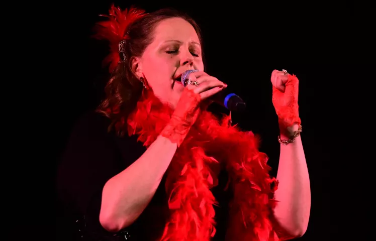 Jody Vander Hart, from Vadnais Heights, sings during the Klondike Kate contest at the DoubleTree by Hilton Saint Paul East on Wednesday, Jan. 11, 2023. (John Autey / Pioneer Press)