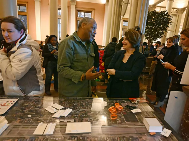 Keith Baker with ReConnect Rondo talks with U.S. Senator Amy Klobuchar during the St. Paul Winter Carnival’s Rondo Night at the Landmark Center in downtown St. Paul on Thursday, Feb. 2, 2023. (John Autey / Pioneer Press)