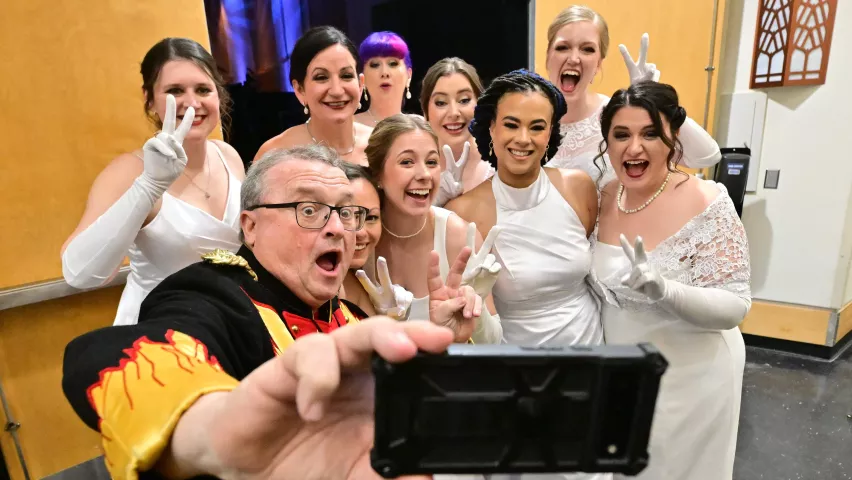 Long time Winter Carnival booster and former Vulcanus Rex LXVII Tom Barrett takes a selfie with the 2024 Winter Carnival Queen candidates during the 2024 St. Paul Winter Carnival Royal Coronation at the RiverCentre in St. Paul on Friday, Jan. 26, 2024. (John Autey / Pioneer Press)