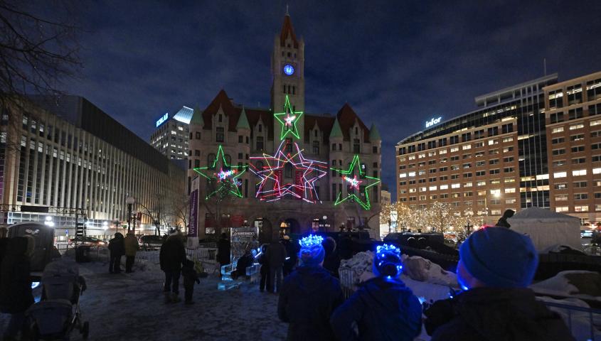 The Landmark Center is the backdrop for a laser light show as part of the Winter Carnival’s Light The Park at Rice Park in St. Paul on Thursday, Jan. 26, 2023. The Royal Family and the Vulcans joined with community members to officially start the 2023 carnival. (John Autey / Pioneer Press)