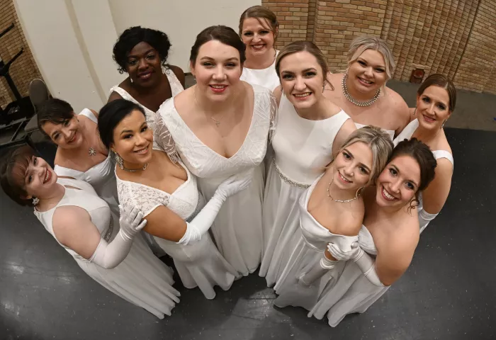 The 2023 St. Paul Winter Carnival Aurora of the Snows candidates pose for a photo during the Royal Coronation at St. Paul RiverCentre on Friday, Jan. 27, 2023. (John Autey / Pioneer Press)