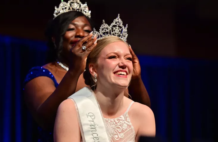 Katy Jo Johnson is crowned the North Wind Princess by outgoing North Wind Princess Rahila Hungiapuko, during the 2024 St. Paul Winter Carnival Royal Coronation at the RiverCentre in St. Paul on Friday, Jan. 26, 2024. (John Autey / Pioneer Press)