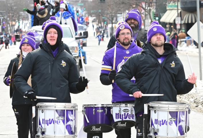 Members of the Vikings Skol drum line march in the 2023 Winter Carnival Grande Day Parade in downtown St. Paul on Saturday, Jan. 28, 2023. (John Autey / Pioneer Press)
