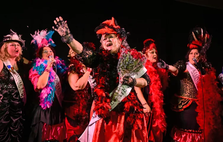 2023 Klondike Kate Maret Bylander waves to the crowd after being sashed at the end of the Klondike Kate contest at the DoubleTree by Hilton Saint Paul East on Wednesday, Jan. 11, 2023. (John Autey / Pioneer Press)