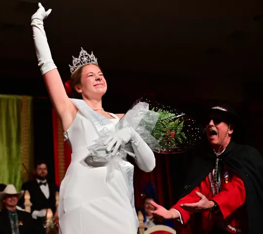 Madalyn McGarry, 2024 South Wind Princess, strikes the traditional South Wind “Ooh La La” pose after her crowning during the 2024 St. Paul Winter Carnival Royal Coronation at the RiverCentre in St. Paul on Friday, Jan. 26, 2024. (John Autey / Pioneer Press)