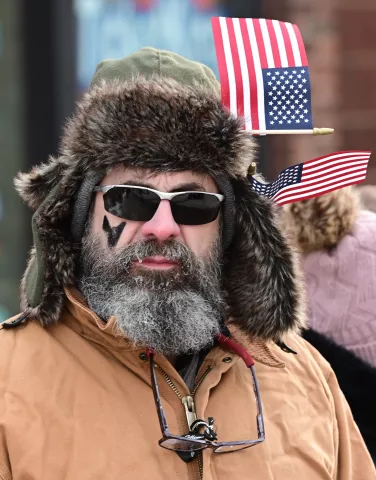 Single digit temperatures didn’t keep John Swoboda from St. Paul from enjoying the 2023 Winter Carnival Grande Day Parade in downtown St. Paul on Saturday, Jan. 28, 2023. (John Autey / Pioneer Press)