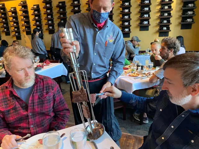 At the Brazilian steakhouse, Bullvino’s Churrascaria in St. Paul's Lowertown, food is served churrasco-style, in which servers roam the dining room with skewers of grilled meats such as chicken, pork, lamb and steak cuts for diners to choose from. Photographed May 4, 2021. (Nancy Ngo / St. Paul Pioneer Press)