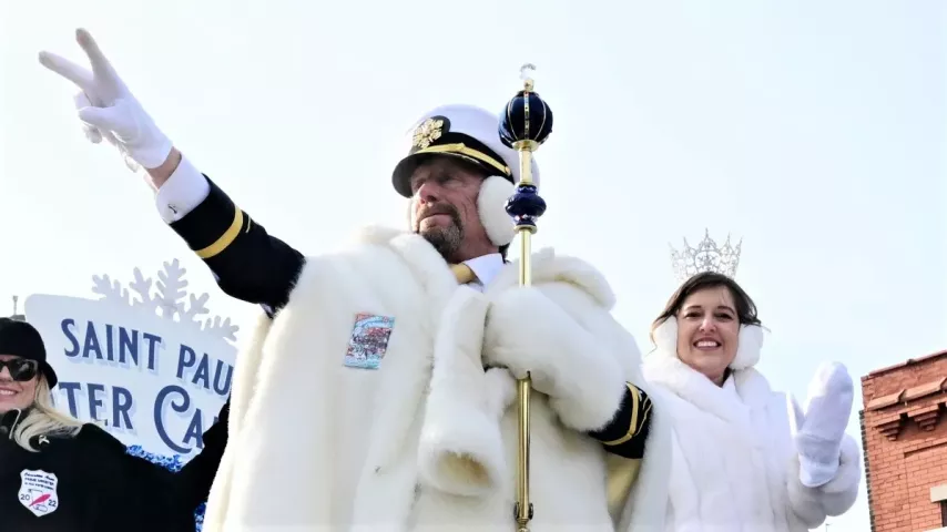 King Boreas LXXXIV, Billy Given, and Aurora, Queen of Snows, Effie Barnes, wave to the crowd during the 2022 King Boreas Grande Day Parade, Presented by Hamernick’s, along West 7th Street in St. Paul on Saturday, January 29, 2022. (John Autey / Pioneer Press)